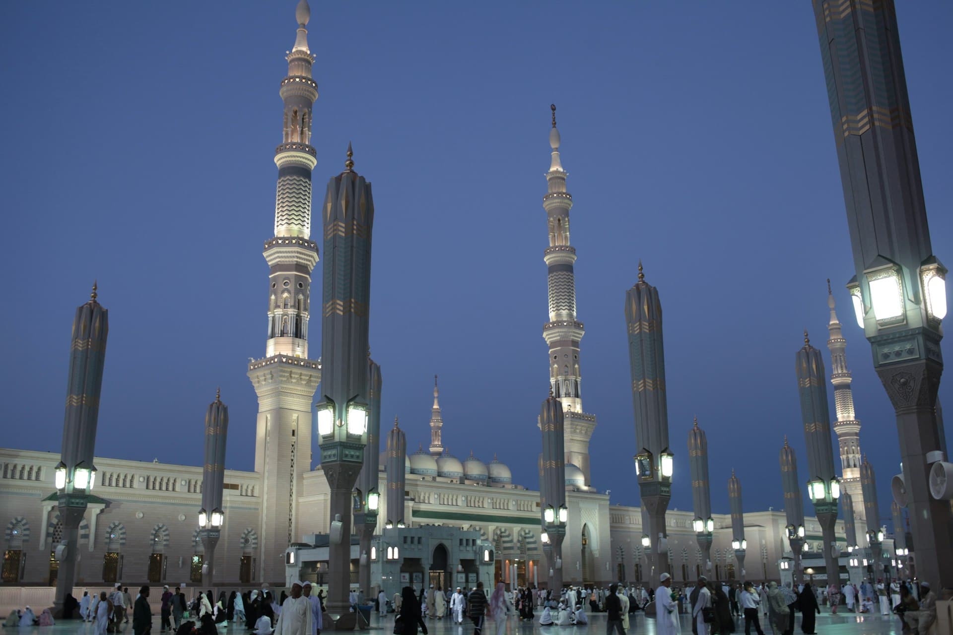 Masjid an-Nabawi illuminated at dusk in Madinah