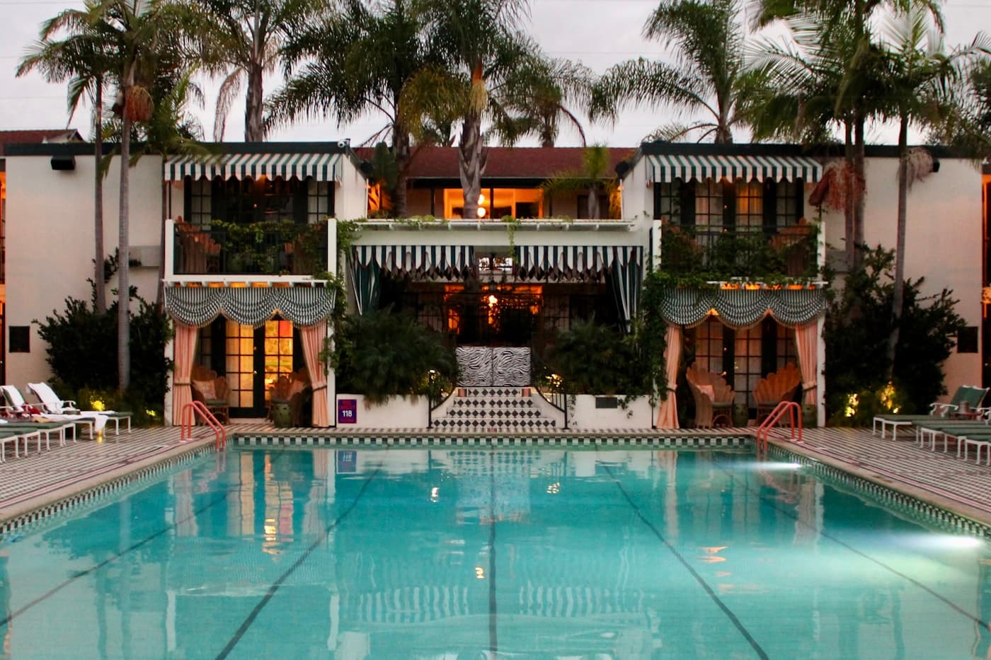 Hotel pool and courtyard at dusk